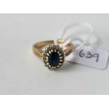 A sapphire and diamond cluster ring, 9ct, size L, 3.1 g