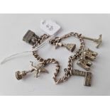 A silver charm bracelet 34 gms