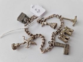 A silver charm bracelet 34 gms