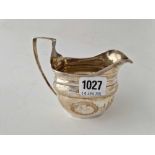 A George III cream jug with reeded rim, London 1806, 158 g