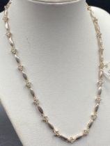 A silver & white stone flower necklace 17g inc