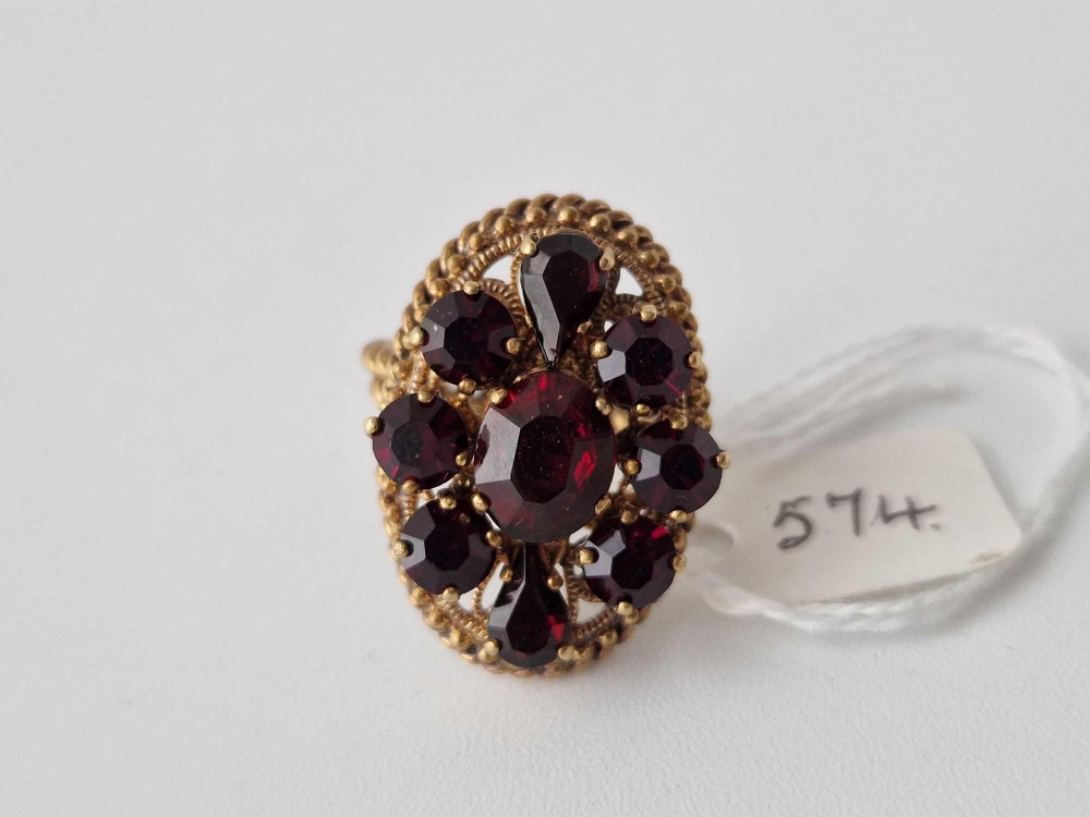 A unusual gilt bohemian garnet cluster