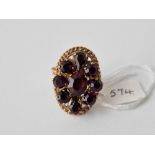 A unusual gilt bohemian garnet cluster