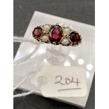 A garnet & pearl 9ct dress ring size J 3.5g inc