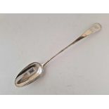 A very large basting spoon OE pattern, 15" long, London 1774 by script GL?,