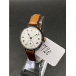 A ladies silver wrist watch with leather strap