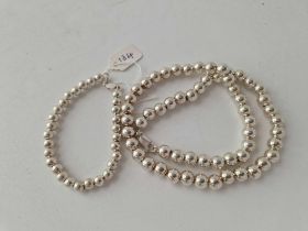 A silver ball bead necklace 17” and matching bracelet