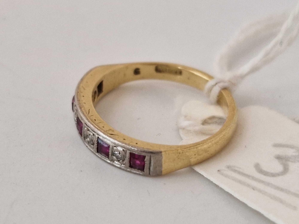 A nine stone ruby and diamond half eternity ring, 18ct, size I - Image 2 of 3