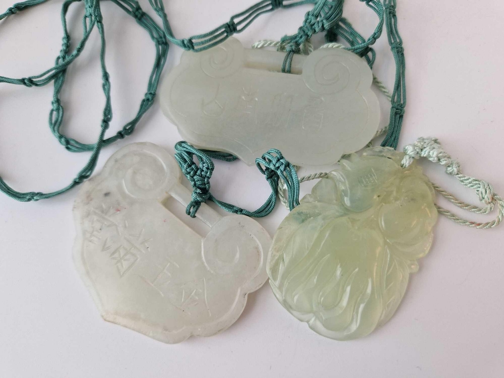 Three carved jadeite pendants - Image 2 of 2