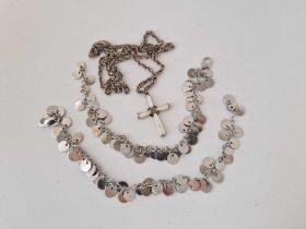 A silver cross and chain, plus two silver brooches