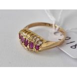 Antique Edwardian 18ct boat shaped ring, set with 5 central rubies, surrounded on either side by
