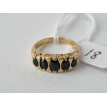 9ct gold carved half hoop ring set with 5 sapphires, size P, 5.7g
