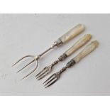 Three bread and pickle forks. MOP handles