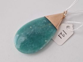 A large green stone pendant with 9ct mount
