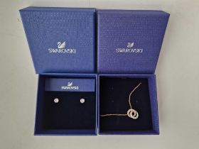 Two SWAROVSKI earrings and pendant