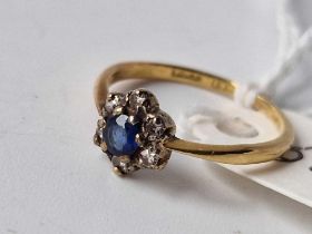 A sapphire and diamond cluster ring, 18ct, size K, 1.8 g