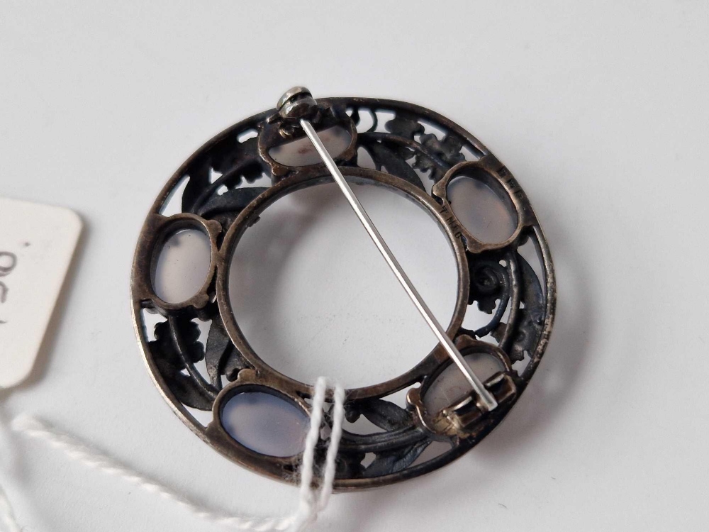 A circular silver brooch - Image 2 of 2