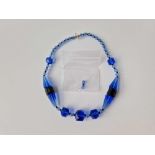 A sky blue art deco blue bead necklace