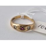 A ruby and diamond gypsy set ring 9ct size P 2.1 gms