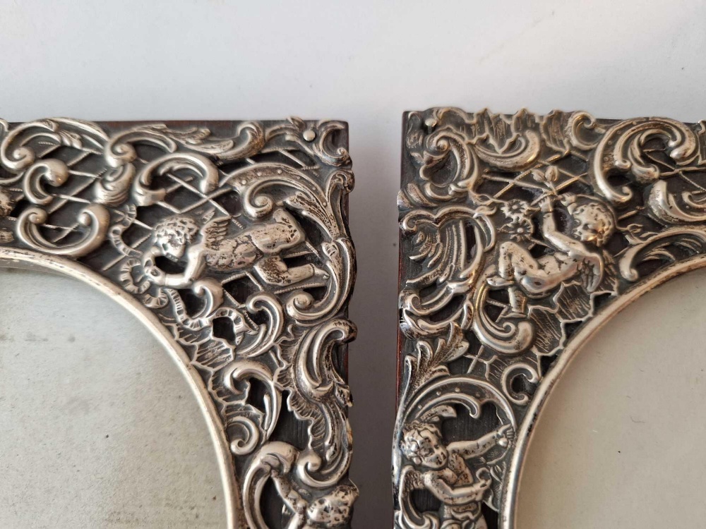 A good pair of decorative photo frames pierced and embossed with scrolls and cherubs, 6" high, - Image 3 of 3