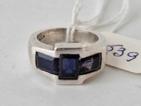 A silver deco style ring with three blue stones size N 9.8g