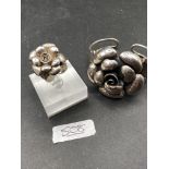A sterling silver flower bangle and matching ring 45 gms