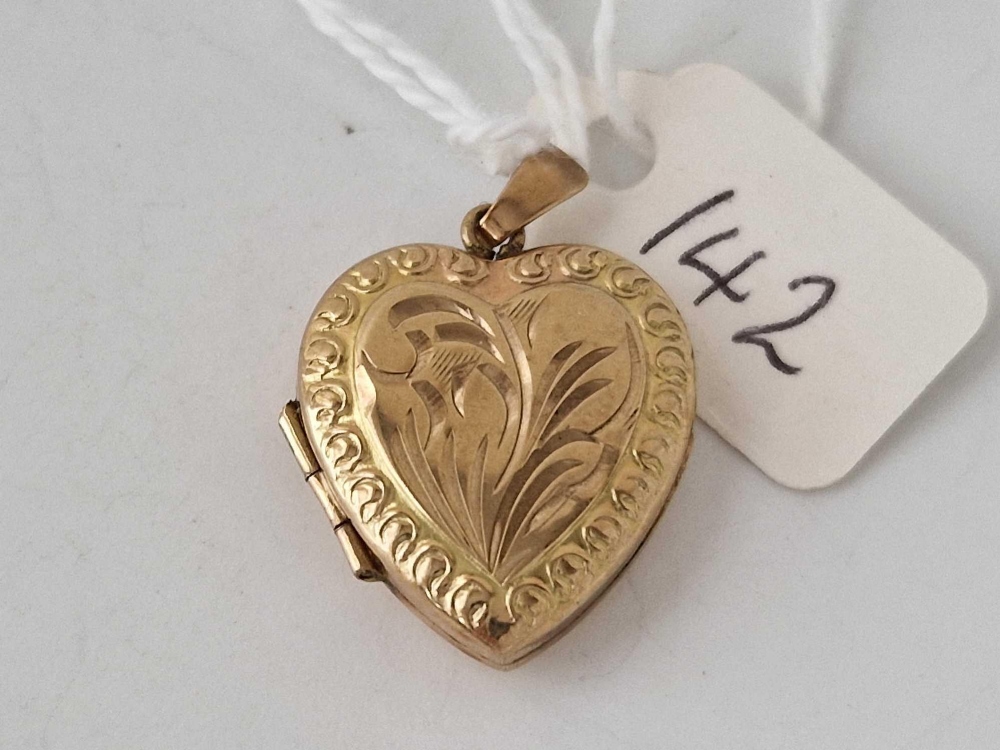 Heart opening locket with floral, engraved design 9ct gold HM.
