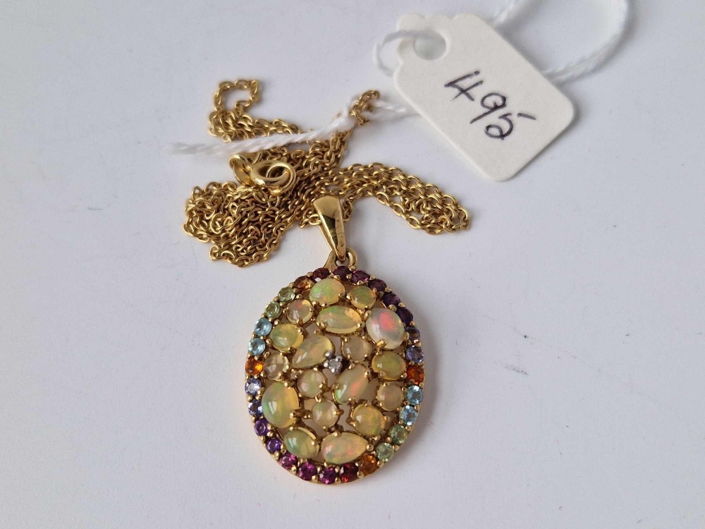 A silver gilt opal pendant on chain, 17 inch