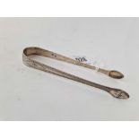 A pair of Georgina bright cut sugar tongs