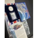 Royal Mint £2 Brittania & £10 stamp set. Scarce set