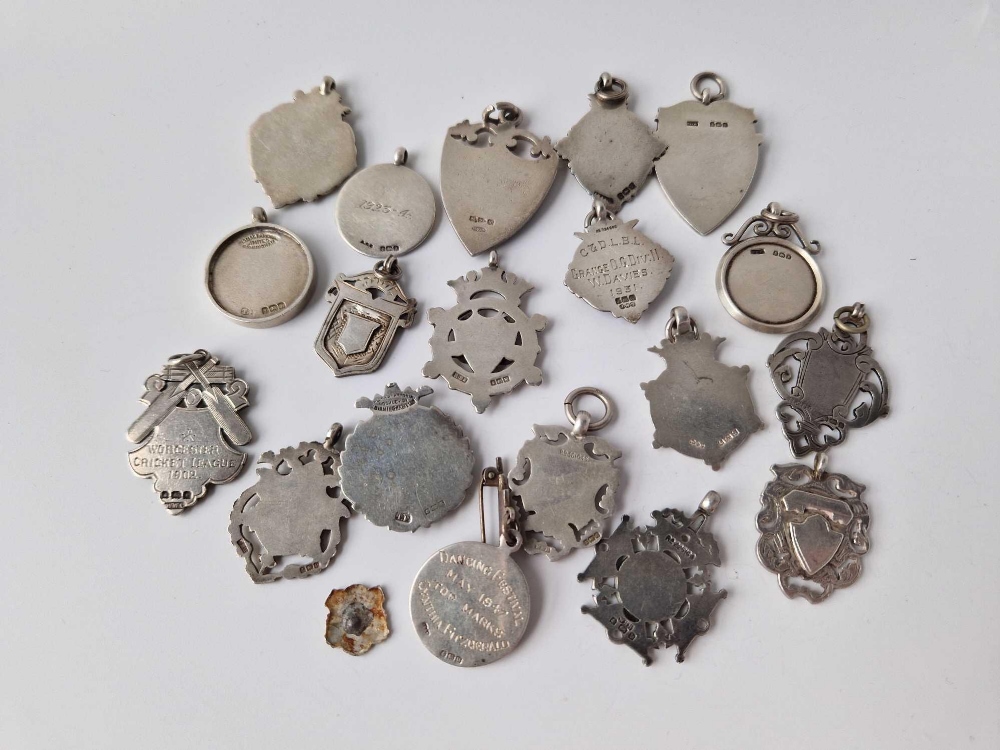 A quantity of silver watch fob medallions, 168 g. - Image 6 of 6