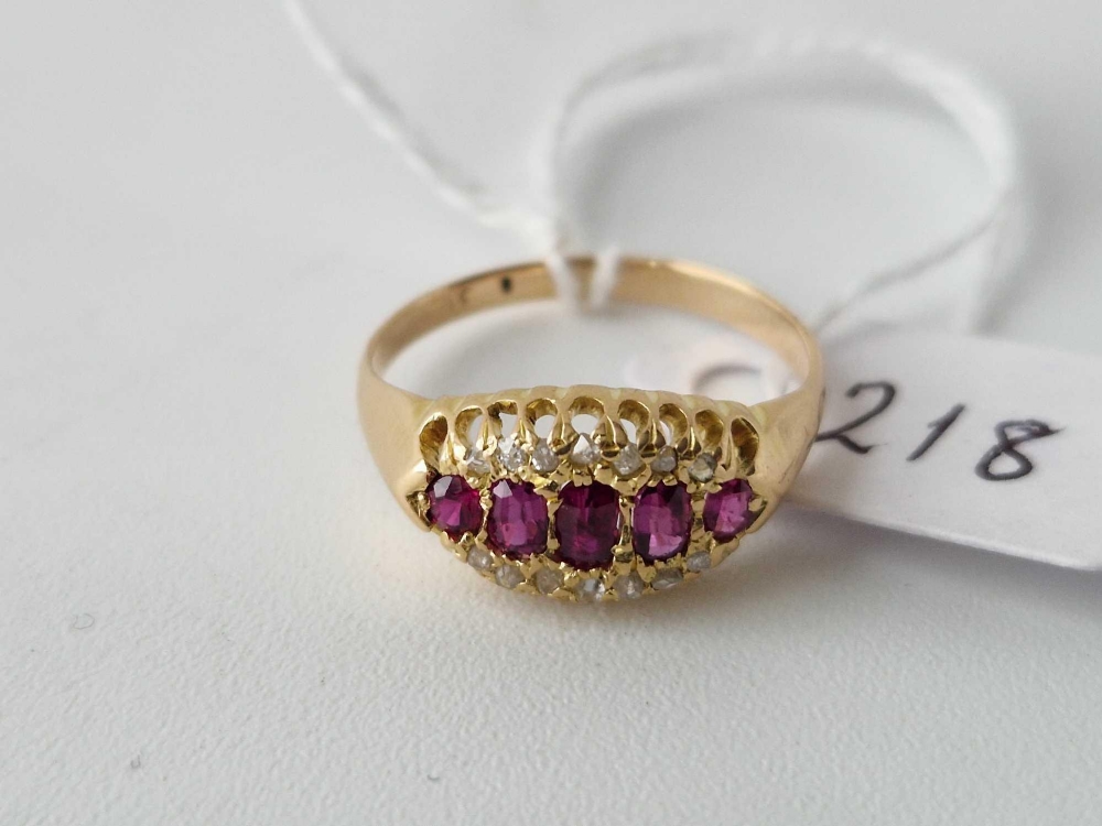 Antique Edwardian 18ct boat shaped ring, set with 5 central rubies, surrounded on either side by - Image 2 of 3