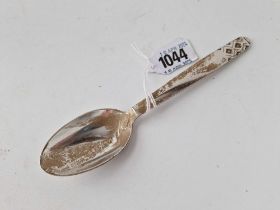 A Georg Jensen spoon of Art Deco design, 7 inches long
