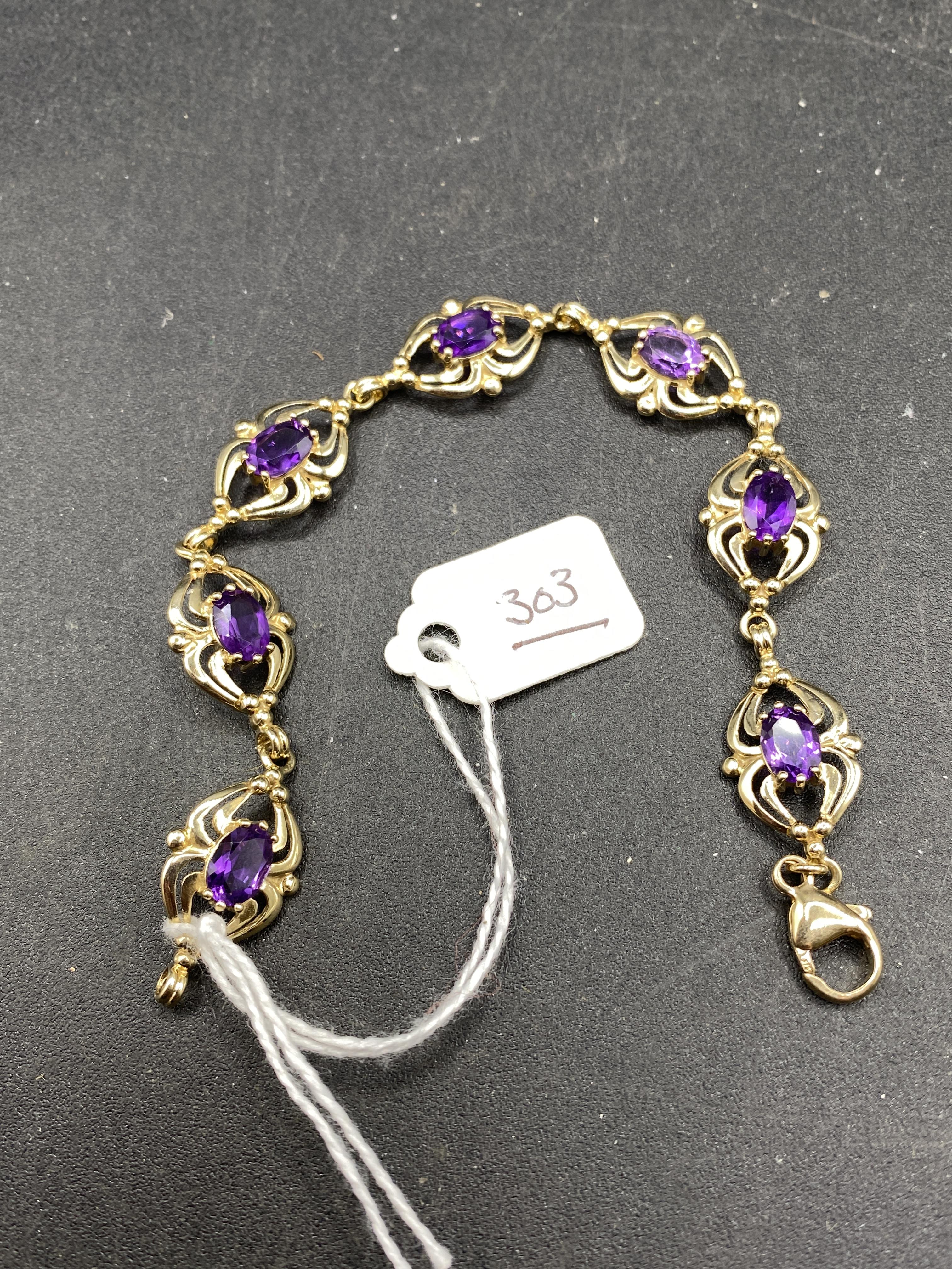 A modern 9ct & amethyst set bracelet 9.8g inc