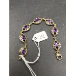 A modern 9ct & amethyst set bracelet 9.8g inc