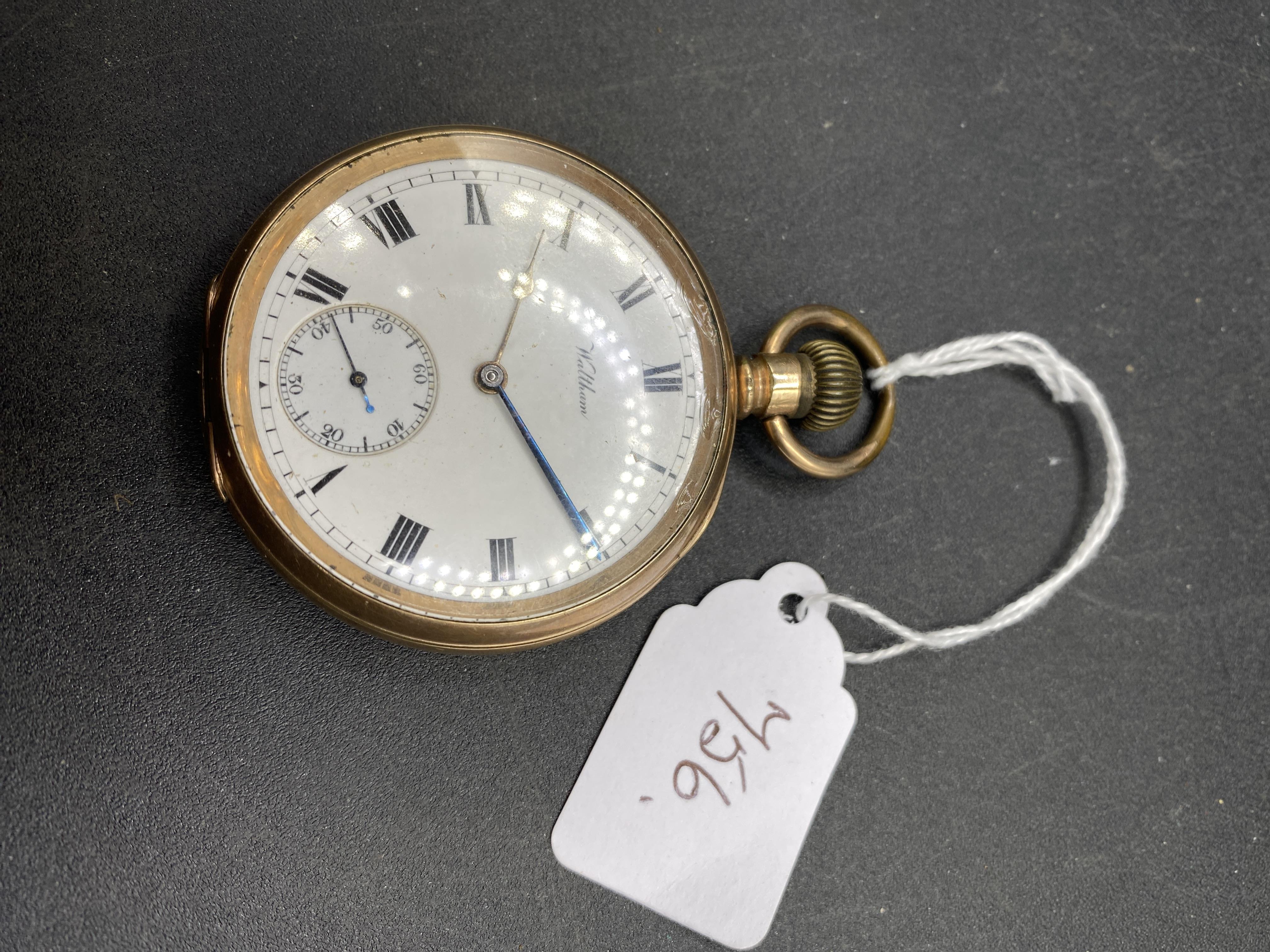 A gents gilt open faced pocket watch by WALTHAM with seconds dial
