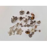 A bag of assorted silver earrings, 41 g