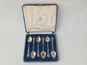 A good set of six Arts and Crafts style spoons with crown finials, 1928 By RE Stone in Aspreys box
