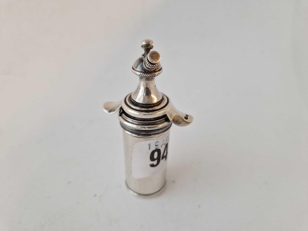 A cylindrical scent atomiser with a sprung body, import mark, 3" high
