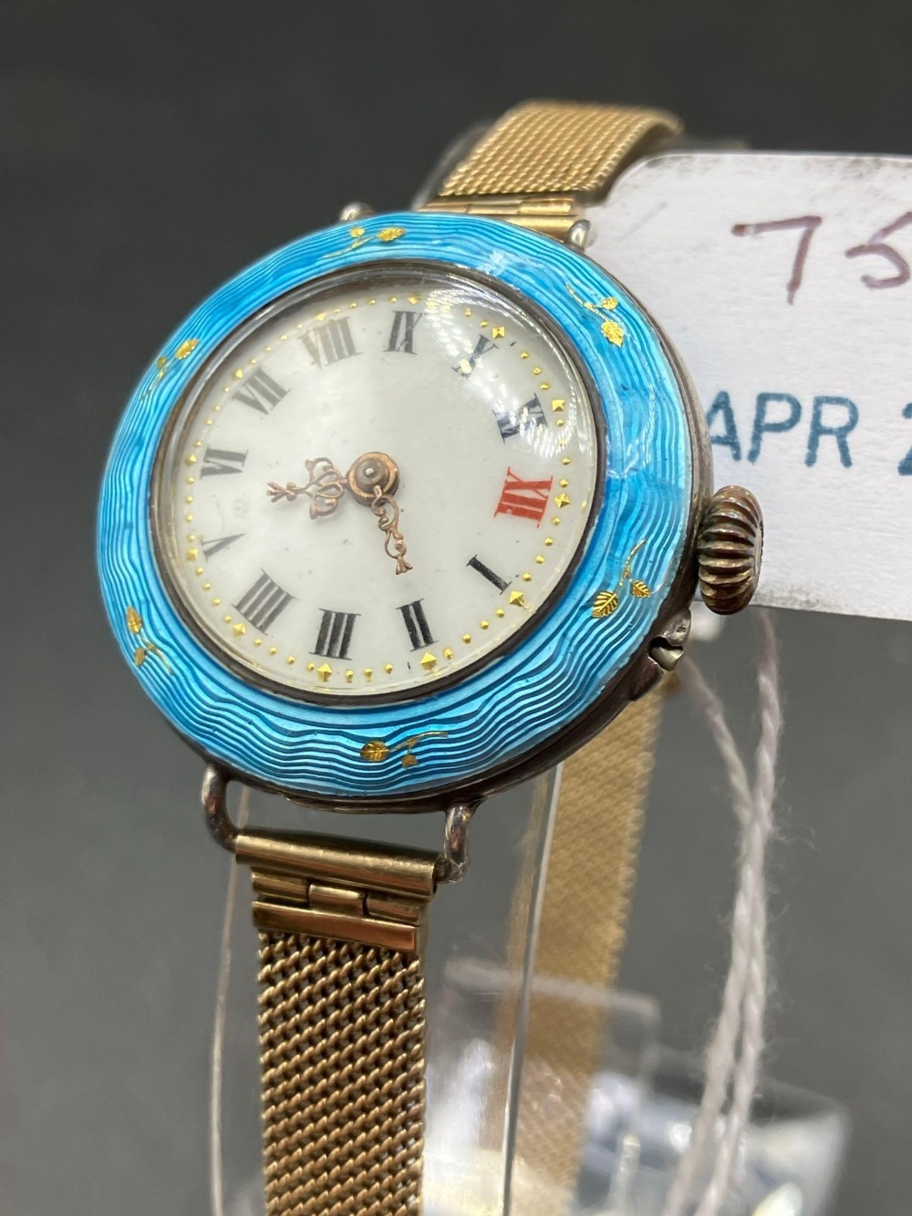 A LADIES SILVER BLUE ENAMEL WRIST WATCH WITH 9CT GOLD FANCY STRAP APPROX 9 GMS