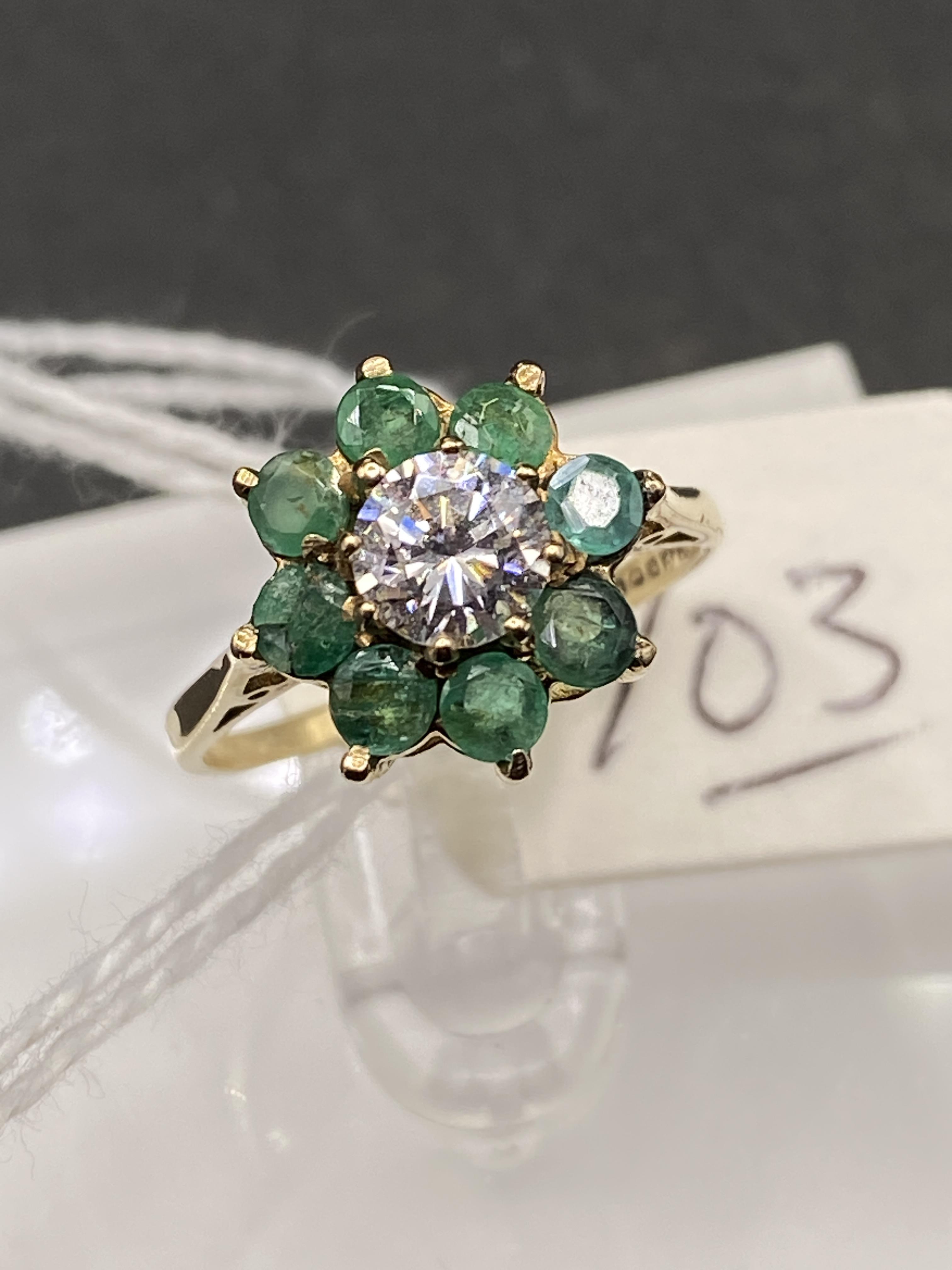 A green and white stone 9ct dress ring size I 2g inc