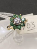 A green and white stone 9ct dress ring size I 2g inc