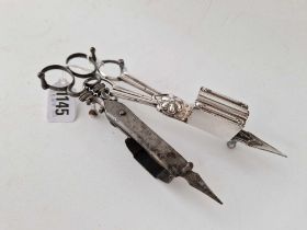 Two pairs of old candle snuffers ( plated )