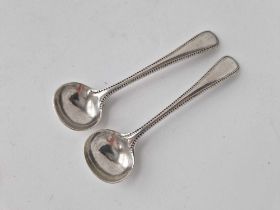A pair of heavy Victorian OE pattern salt spoons with beaded edge by CB, 1874, 46g