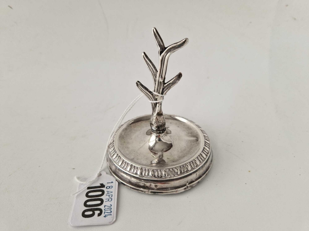 A ring tree 3" high and a silver top jar with angels heads, Birmingham 1917