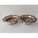 Pair of Sheffield plated wine coasters, vine decorated borders. 7.5 in diam