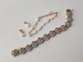 A 800 standard silver fancy bracelet and a pearl and earring set