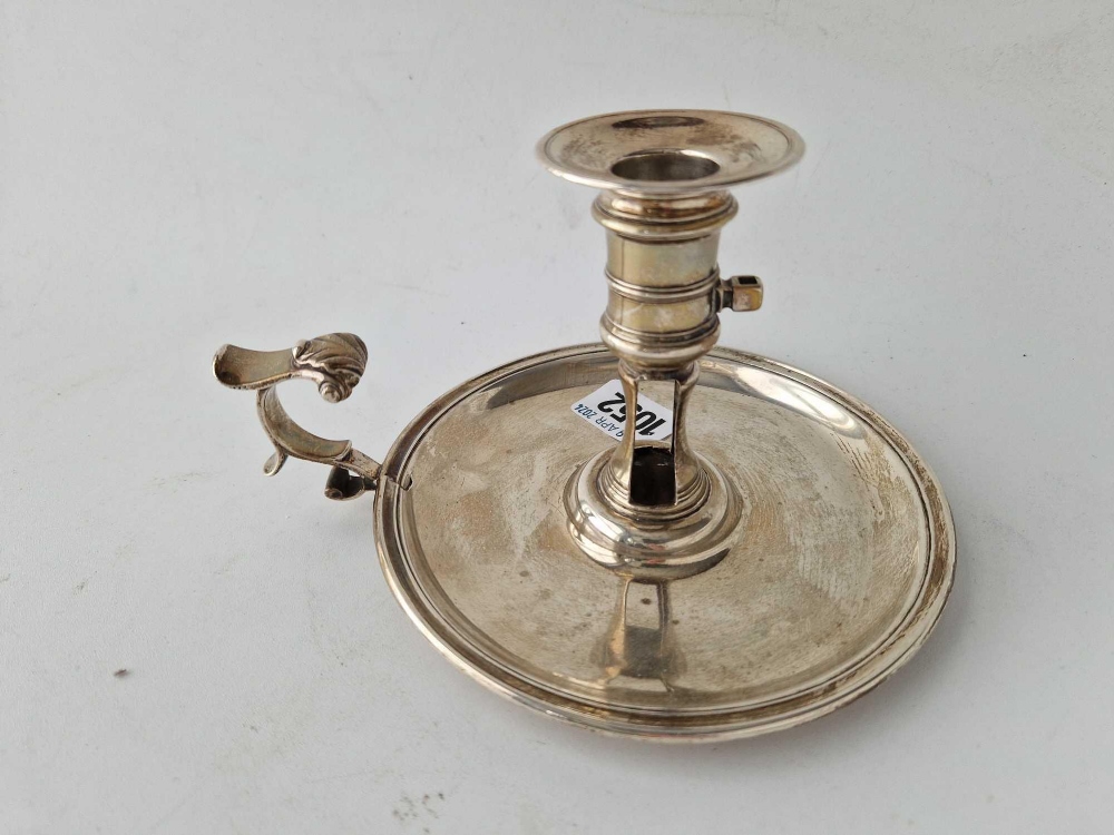 A George II chamber candlestick with leaf capped scroll handle, 5.75 diameter, London 1758, 325 g - Image 2 of 2