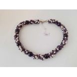 A hand made silver amethyst and seed pearl necklace, 18 inch