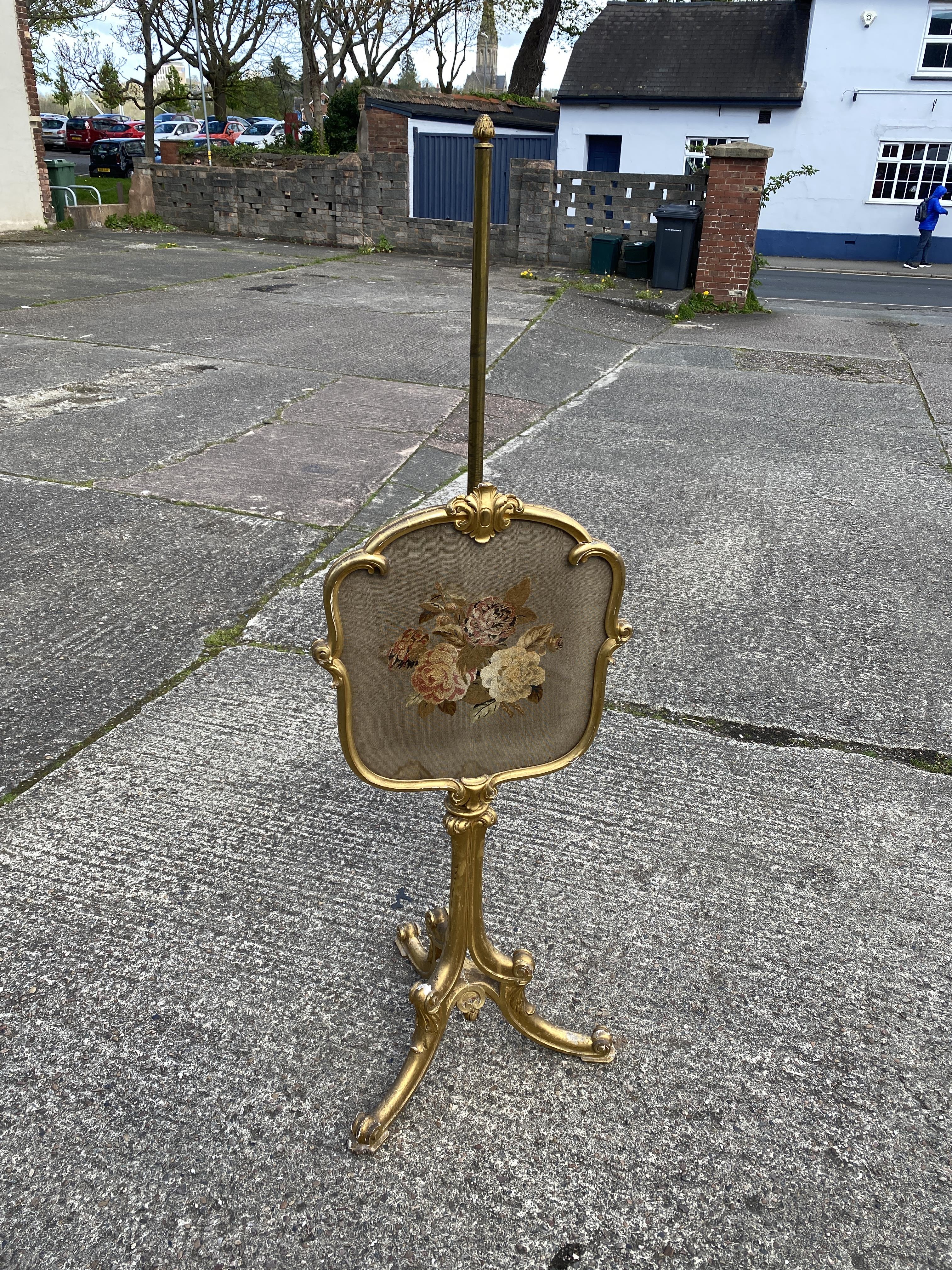 Victorian gilt pole sceen on tripod base, with needlework panel